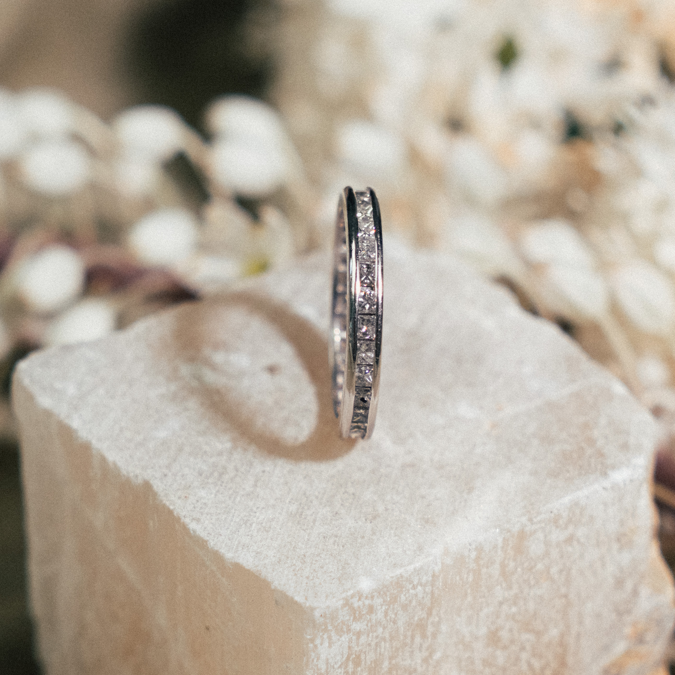 Platinum Princess Cut Channel Eternity Band